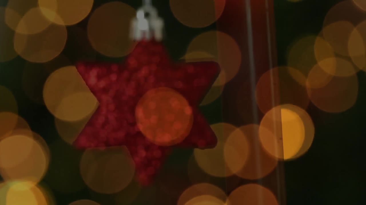 animación de velas sobre la estrella de navidad