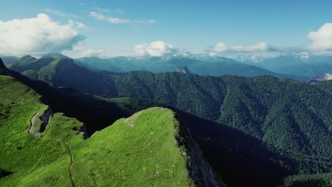 aerial pan reveals deep vietnam valleys and emerald green forests