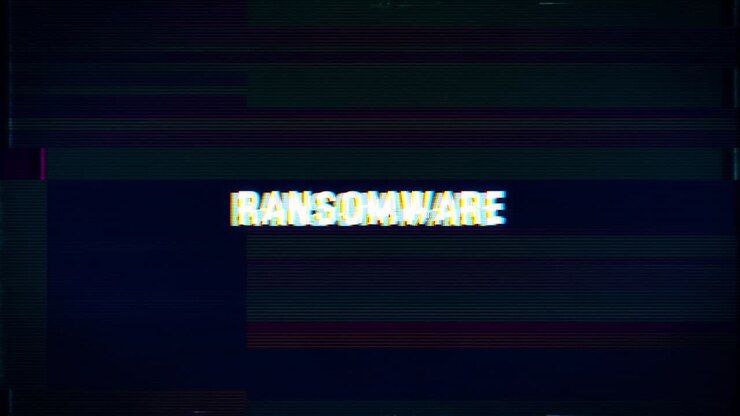 Ransomware Attack glitch text. Anaglyph 3D effect. Technological retro background. Hacker application, Ransomware, virus concept. A computer program, cyber security, TV channel screen