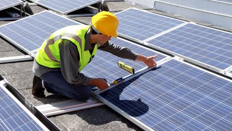 male worker working at solar station 4k