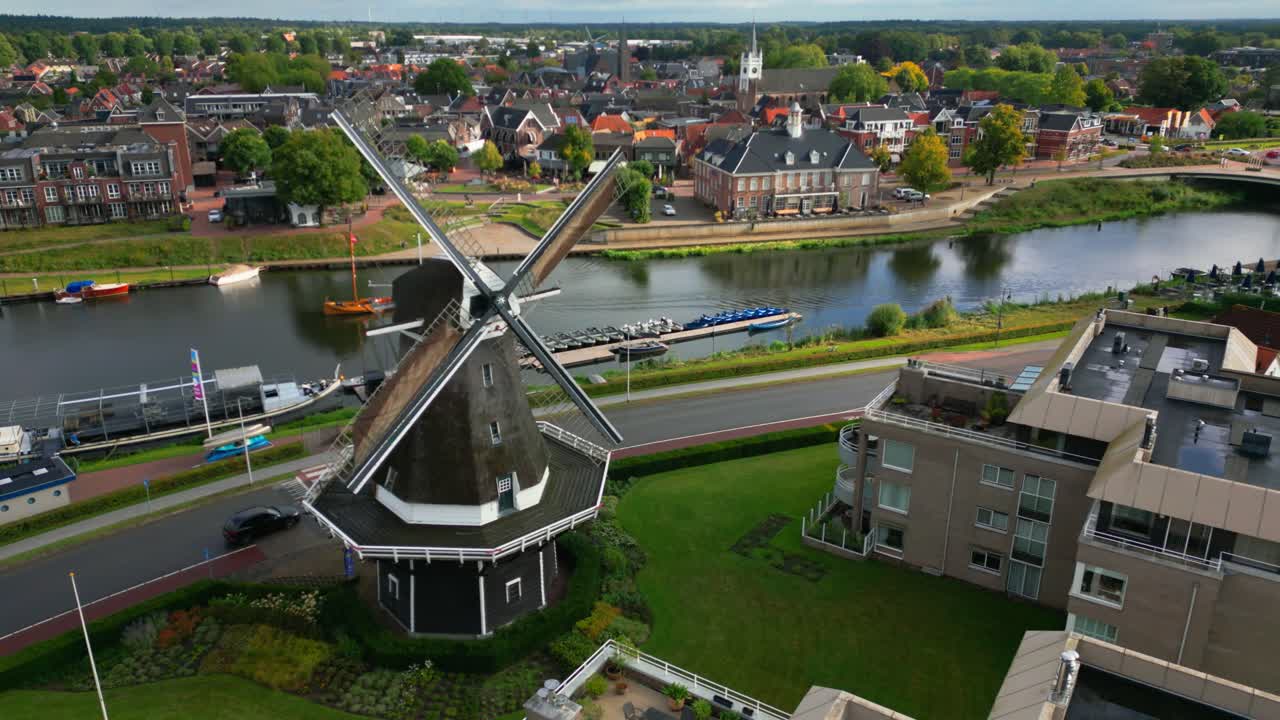 Aerial View of a Windmill and Town