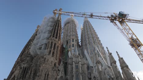 a breathtaking view of la sagrada familia in barcelona under sunny skies