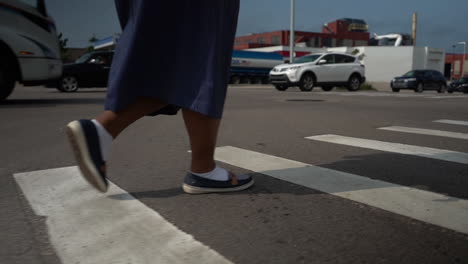 african american black woman crossing the street