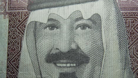 this is the macro view of a normal paper bank not- money- currency ofsaudi arabia 100 riyals bill