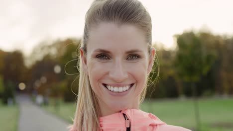 handheld view of smiling young woman looking at camera