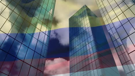animación de la bandera ondeando de colombia y el procesamiento de datos financieros sobre el paisaje urbano