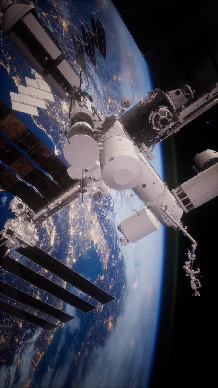 International space station orbits earth showcasing city lights at night