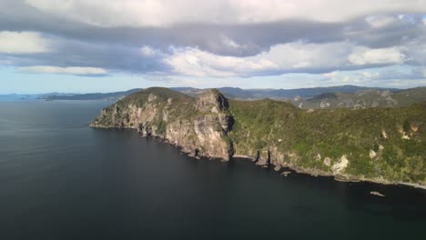 bay of islands rugged clifftop flying into the mountains of new zealand