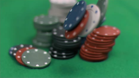 gambling chips falling in super slow motion