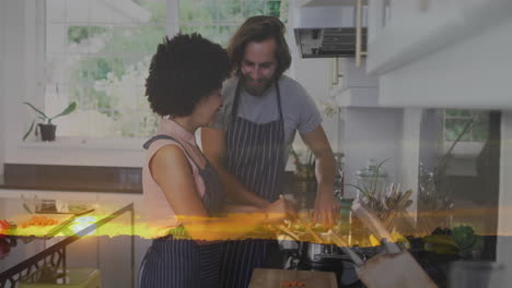 in kitchen, couple cooking together with sunset animation overlay in background