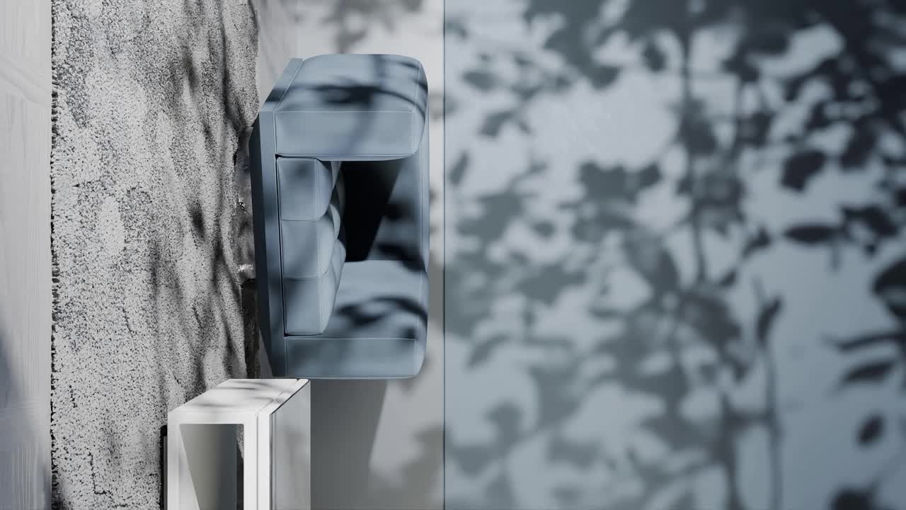 Modern sofa next to marble side table against a blue textured concrete and peach wall with shadow of tree branches. Studio interior photography. Interior design concept. Design for poster. vertical