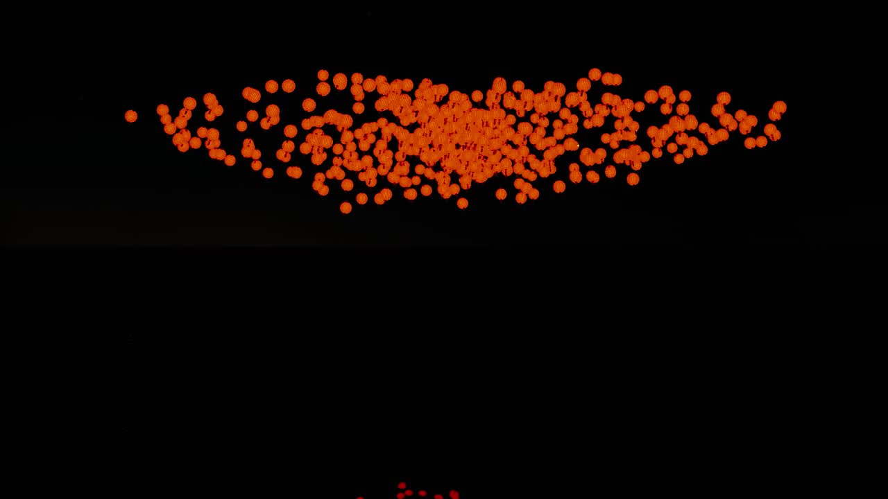 cúmulo de esferas naranja sobre fondo negro