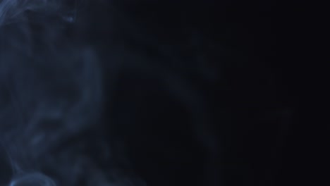 fondo negro de 4k de partículas, polvo y humo en movimiento