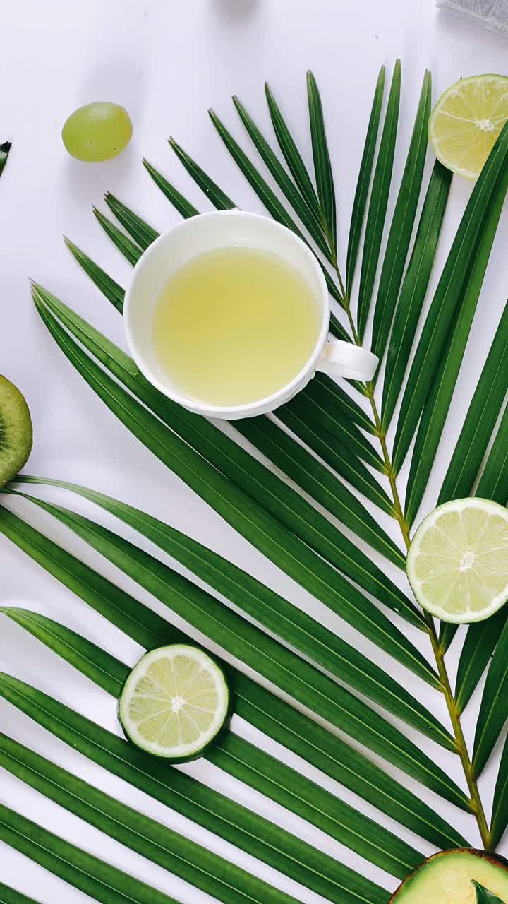 Tropical Refreshment with Tea and Fruits