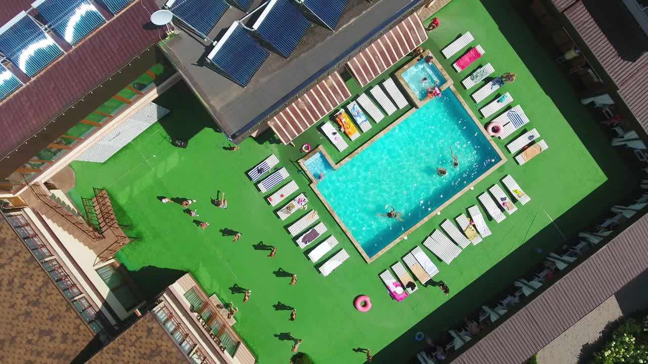 Resort with Swimming Pool and Solar Panels - Aerial View