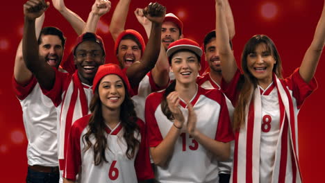 group of fans cheering for their team