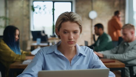 smart lady boss thinking at business strategy sitting coworking space close up.