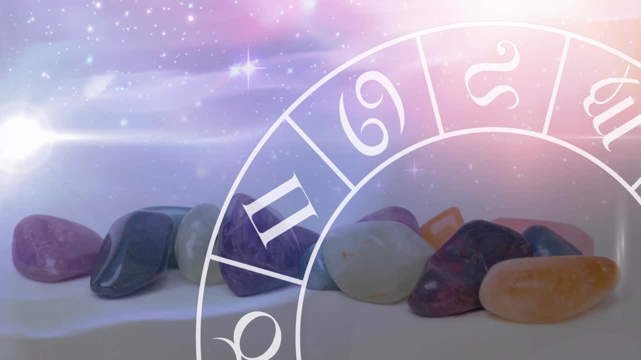 animación de estrellas y zodiaco moviéndose sobre piedras en superficie blanca