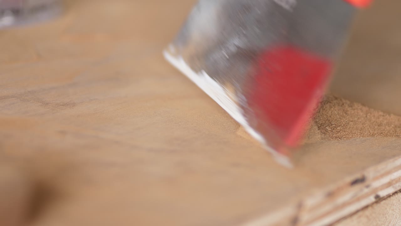 collecting fine sawdust shavinging close up