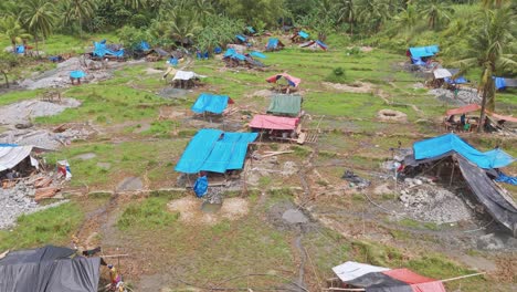 Many unregulated dangerous mining camps destroy rice paddies as gold rush fever hits the area.