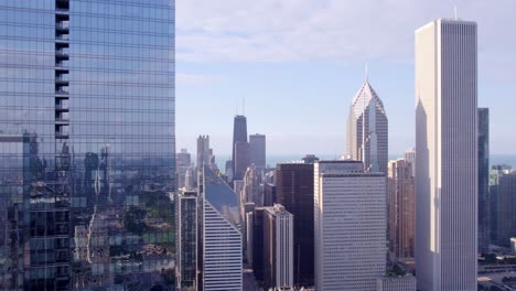 experience the dynamic atmosphere of chicago's crowded streets and skyline through captivating drone footage.