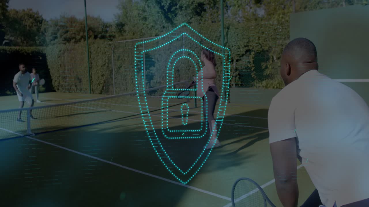 Far-left player hitting ball, tennis pair playing rally while teal shield obscuring court for drill