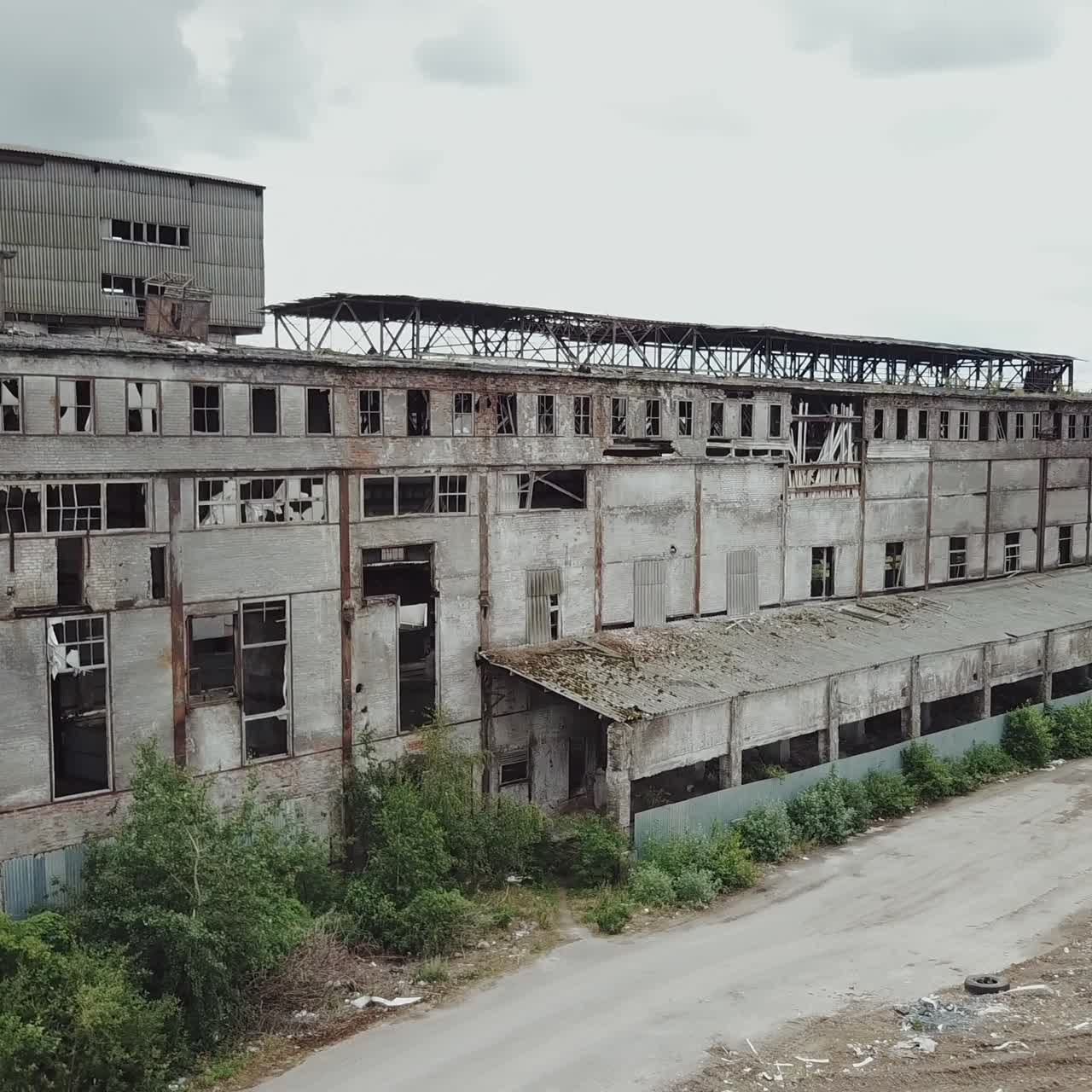 Abandoned ruined industrial factory building, ruins and demolition concept. Aerial view