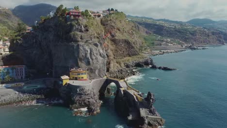 Serene-scenery-with-calm-blue-water-at-idyllic-coast-of-Madeira,-aerial