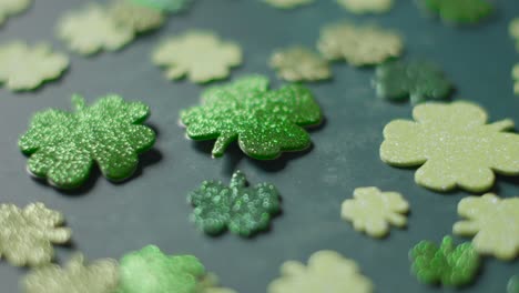 close up studio shot of green shamrock shapes on background to celebrate st patricks day 1