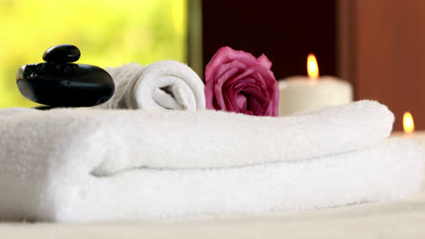 fresh towels with black stones