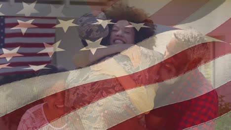 Animation-of-male-soldier-embracing-smiling-family-over-american-flag
