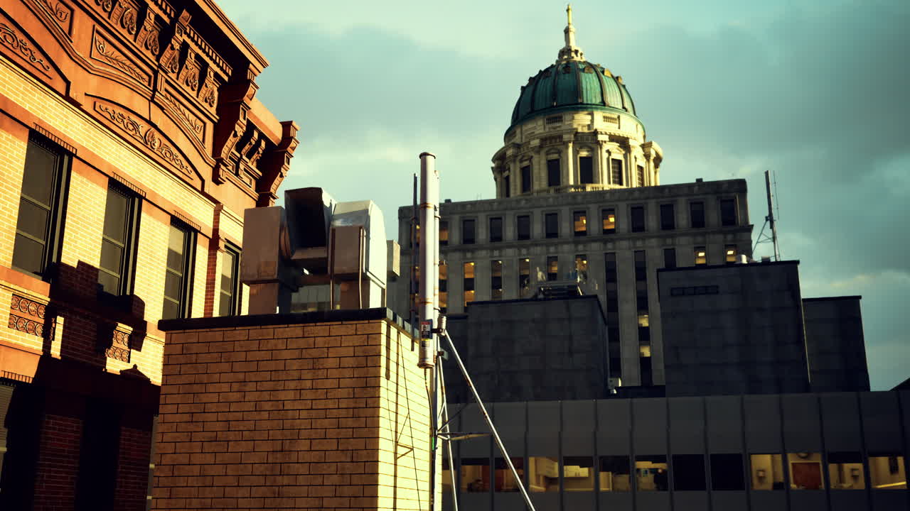 Urban skyline at sunset highlighting modern and historic architecture