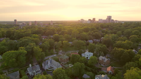 pull away from clayton skyline and sunset over houses in beautiful neighborhood in st