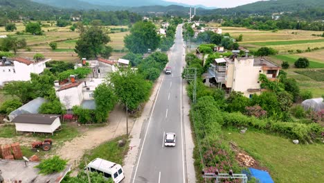 aerial view of a rural road in a small village