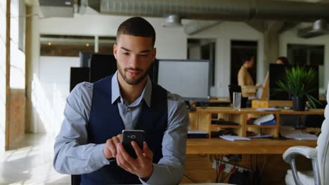 executive using mobile phone in office 4k