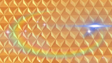 digital animation of abstract 3d shapes on yellow background against shining stars in space