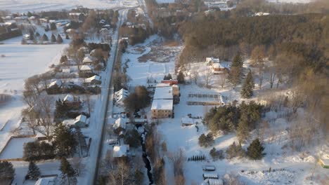 Snowy alton mill in caledon, ontario, showcasing peaceful surroundings, aerial view