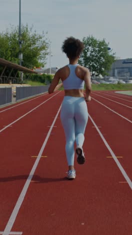 woman running on a track