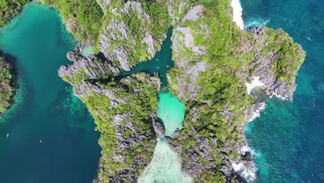 lagoons with clear water, popular tour destination from el nido, palawan, philippines. drone reveal