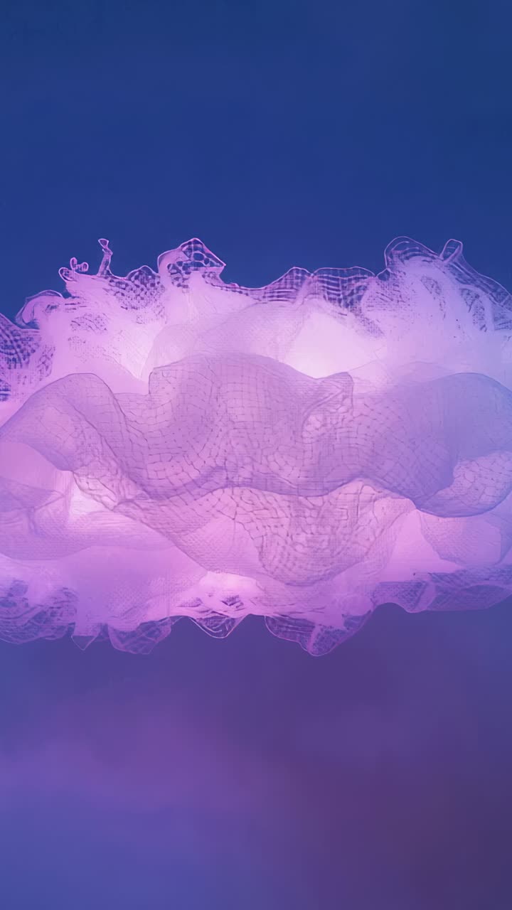 Vertical video: Pulsing LED bathing ruffled lampshade at ceiling, showing mesh and warm tones