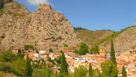 panoramic view of old spanish village in mountainous area, view of castle ruins in borriol, spain