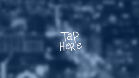 animation of tap here text over cityscape