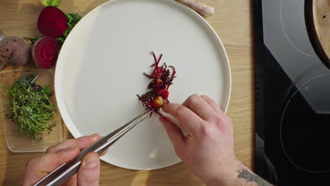 food plating with beetroot and microgreens