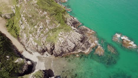 drone-shot-over-Bonaparte-beach-in-Plouha-village,-used-by-the-french-resistance-during-ww2-to-help-english-pilots-escape-the-germans