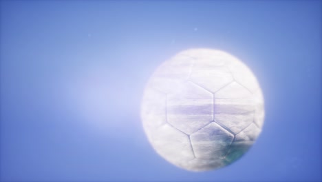 soccer ball on blue sky background