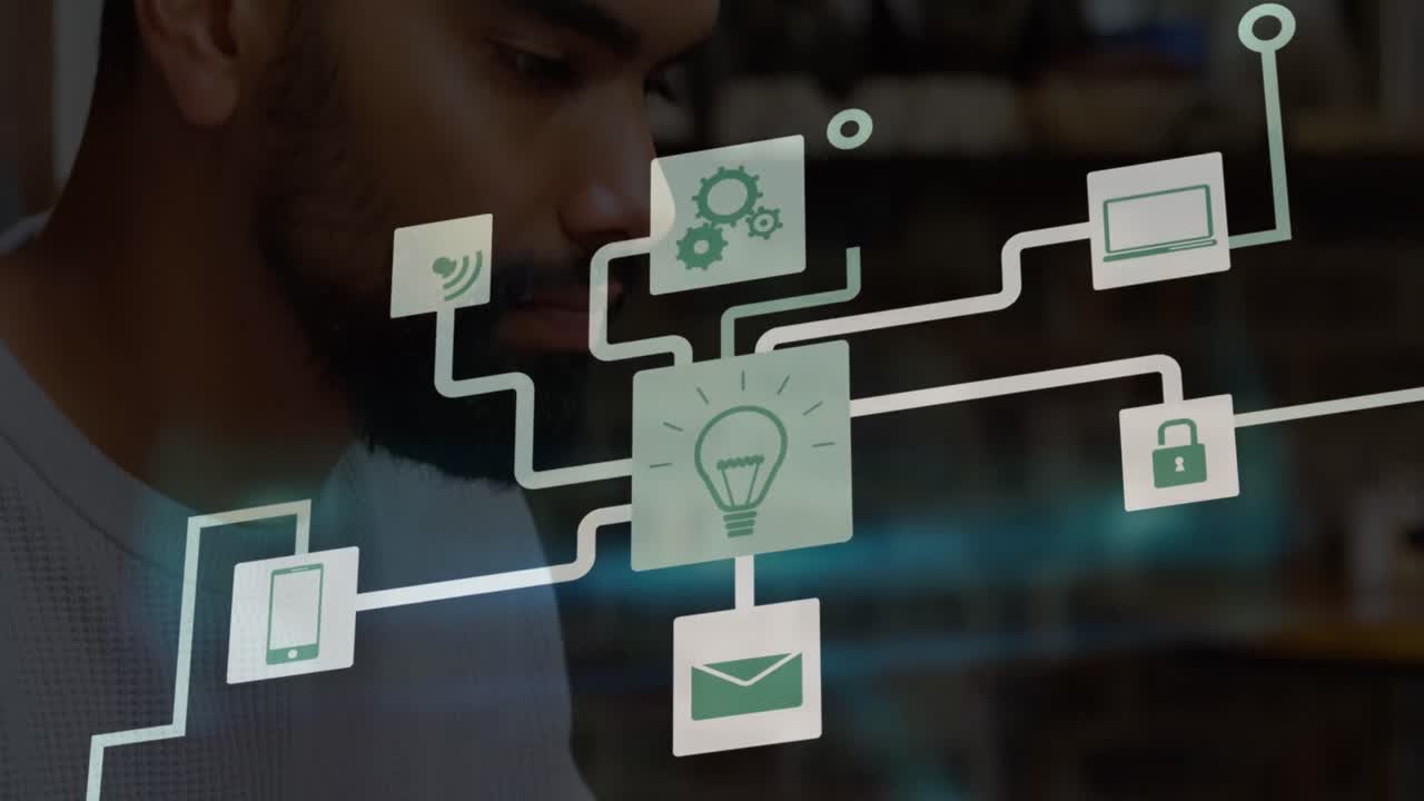 animación de la red de iconos digitales sobre un hombre afroamericano usando una computadora portátil en la oficina.