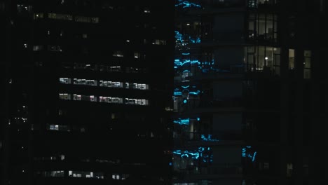 philadelphia skyline, at night, with buildings, lights, and reflections