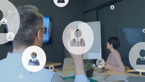 animation of profile icons over rear view of caucasian man rasing his hand during a presentation