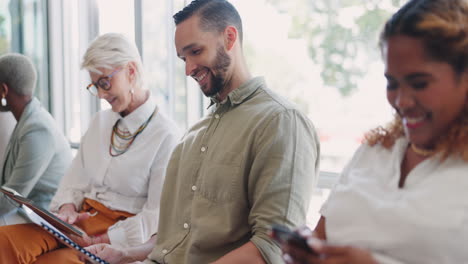 Networking,-man-and-woman-shaking-hands-in-waiting