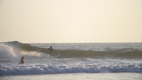 man surging along a wave